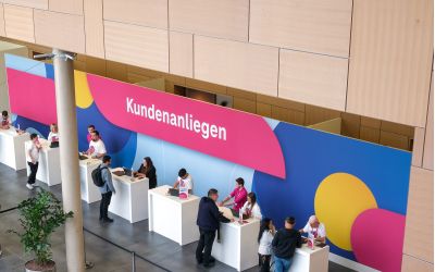 Telekom Hauptversammlung Schalter für Kundenanliegen
